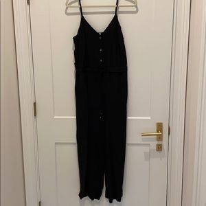 Black jumpsuit sized medium with tie waste